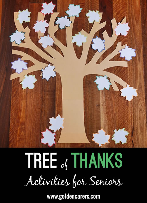 A homemade gratitude tree can be made from cardboard attached to a wall or whiteboard.